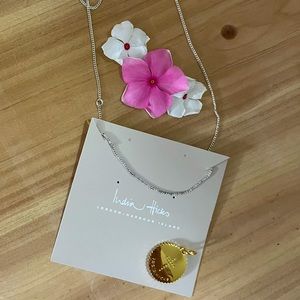 India Hicks necklace and cross token